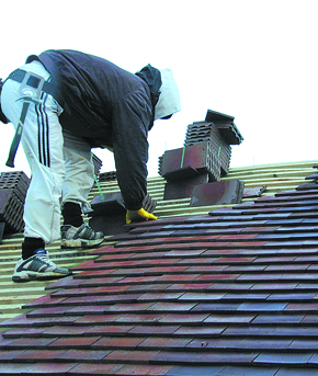 Roofer working on a roof